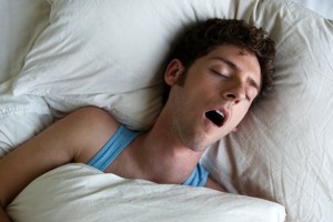 Man-sleeping-and-snoring-