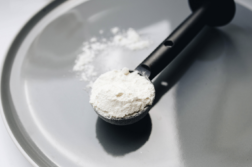 powder put in a measuring spoon