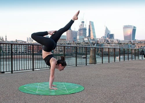 yoga with circle green carpet